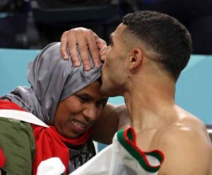 Achraf Hakimi celebrating with his mother after Morocco's win against Belgium is everything